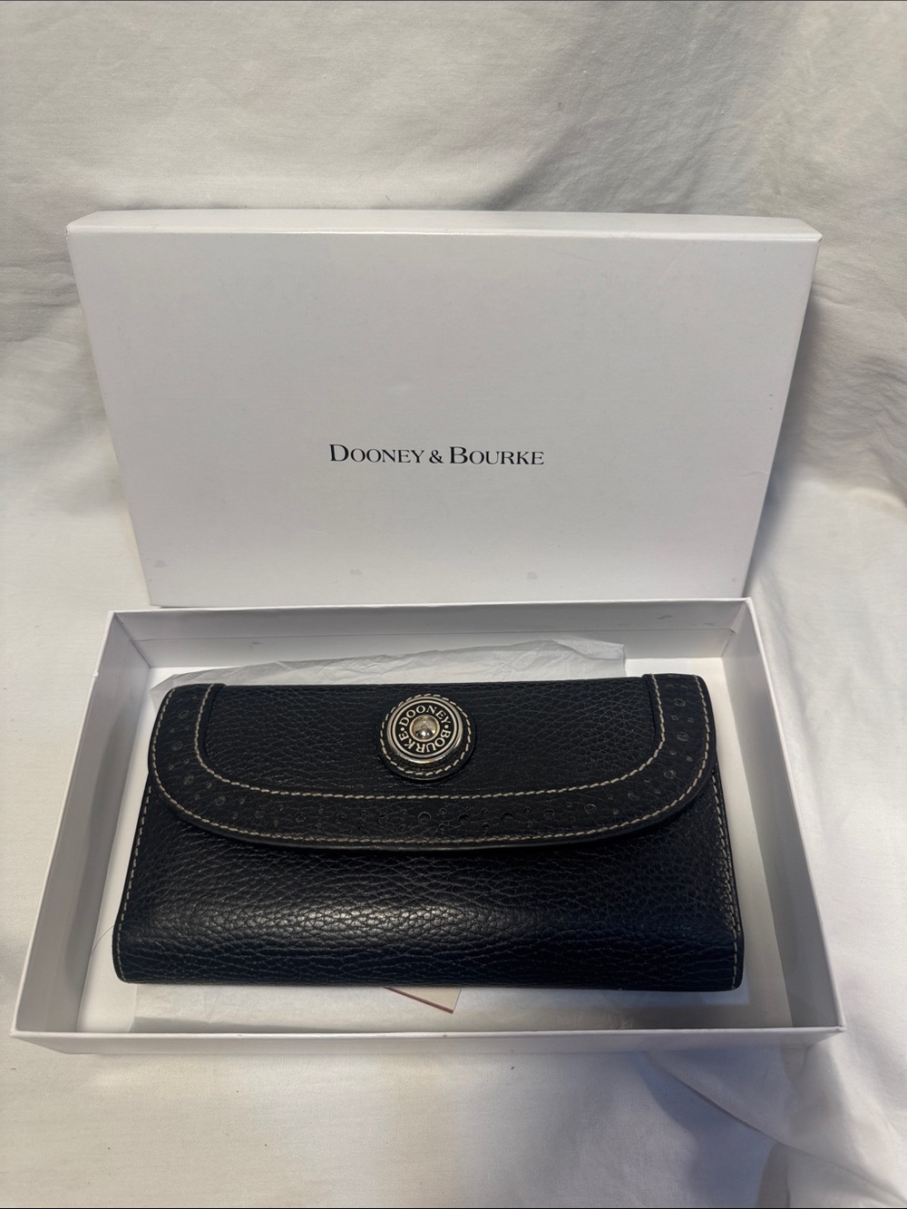 Dooney & Bourke Black Pebbled Leather Flap Wallet with Logo Button